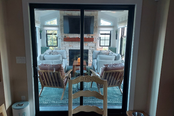 Inside view of bump out addition complete with fireplace in Bishops Bay.